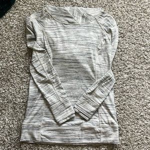 Lululemon Women’s running top with hood and zip pocket